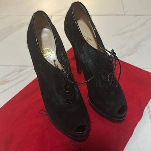 Brand New Christian Louboutin bootie with slip guard
